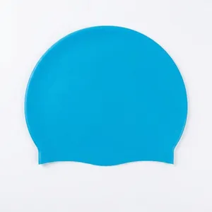 Detailed view of high-elasticity blue silicone swimming cap for adults swimming gear
