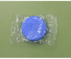 Universal blue silicone water bucket sealing lid shown in its transparent dustproof plastic wrap