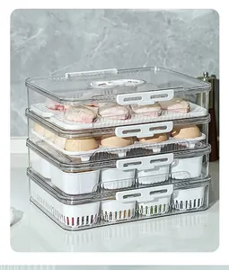 Close-up of a four-layer transparent refrigerator storage box with food compartments