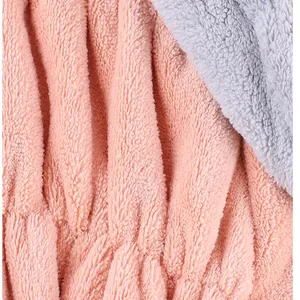 Close-up of soft microfiber quick-dry hair towel cap coral plush texture