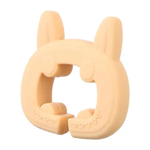 Creative peach silicone rabbit pot lid holder and anti-overflow clip for modern kitchen