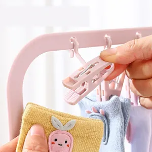 Multi-functional pink folding drying rack with strong anti-slip clips for socks and baby clothes