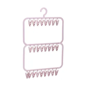 Pink foldable 24-clip plastic sock drying rack for efficient balcony laundry organization