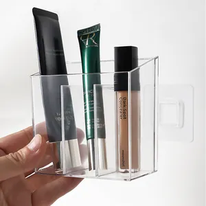 Clear acrylic wall-mounted cosmetic organizer with 3 dividers for makeup storage