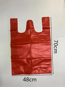Detailed view of a red 70x48cm plastic packing bag for heavy duty moving and storage.