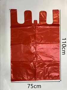 Close-up detail of a large red plastic moving storage bag showing 110x75cm dimensions