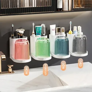 Portaspazzolino da parete con quattro bicchieri colorati per avere un bagno ordinato