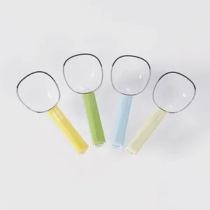 Set of four colorful 2-in-1 plastic rice measuring scoops with functional bag clip handles