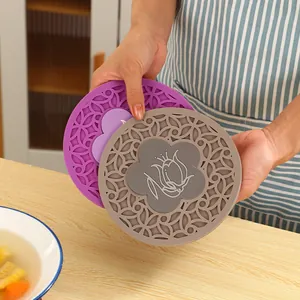 Heat resistant round silicone kitchen mats with elegant floral cutout design and patterns