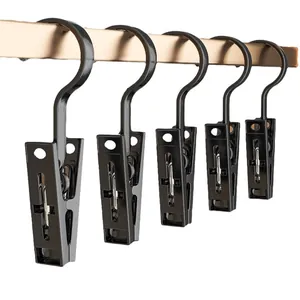 Juego de cinco clips de plástico negro multiusos con ganchos para ropa y gorras