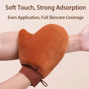 Soft flocked tanning mitt for even application of body lotion and sunless tanner.