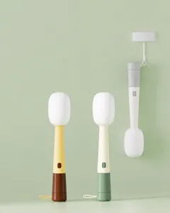 Detail view of 3-in-1 microphone-shaped cup brushes in various pastel colors.