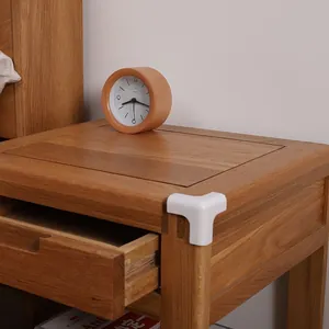 White L-shaped baby safety corner protector for wooden tables and furniture edges