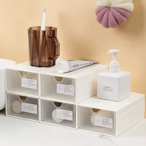 Cajas de almacenamiento apilables con cajones blancos para oficina y dormitorio.