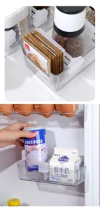 Detailansicht verstellbarer Kühlschrank-Trennclips zur Organisation von Türregalen.