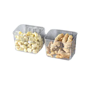 Wall-mounted transparent kitchen storage baskets for ginger and garlic organization