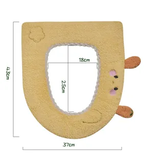 Detailed dimensions of cartoon plush toilet seat cover: 43cm x 37cm with 18cm x 25cm opening