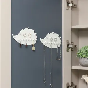 Porte-bijoux adhésif créatif en forme de hérisson blanc pour colliers et bagues.