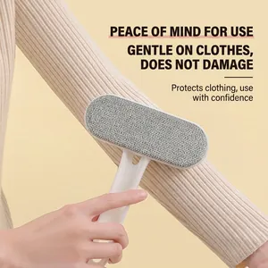 Double-sided electrostatic lint remover brush for clothes and bedding, white and grey design