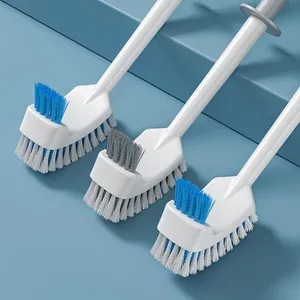 Set of three long-handle toilet brushes with dual-sided bristles on blue background