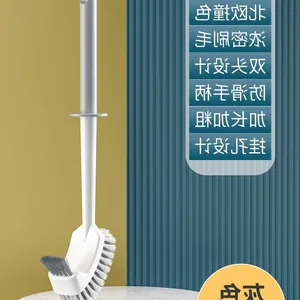 Wall-mounted toilet brush set with long handle and double-sided grey bristles for bathroom.