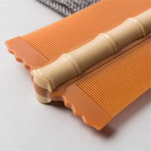 Fine-tooth flea comb for dogs and cats with decorative beige bamboo-style handle