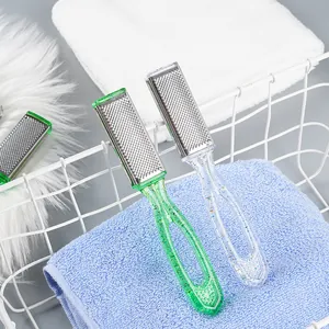 Set of two professional double-sided foot rasps for callus removal in a clean bathroom