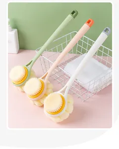 Detail of dual-sided bath brushes with soft bristles and loofah in pastel colors