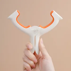 Large windproof plastic quilt clip in white and orange for heavy laundry drying