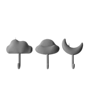 Set decorativo di tre ganci adesivi grigi a forma di nuvola, pianeta e luna crescente