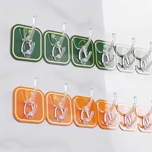 Multi-functional self-adhesive wall hooks for clothes and bathroom accessories