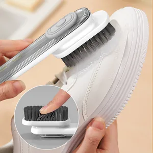Professional hydraulic shoe cleaning brush with soft bristles and liquid dispenser button