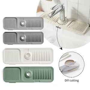 Silicone faucet splash guard and drain mat with DIY cutting feature in multiple colors.