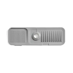 Grey silicone faucet splash guard mat with drainage ridges for kitchen sink countertop