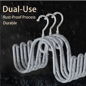 Multi-loop grey shoe drying rack with rust-proof metal hooks for balcony use.