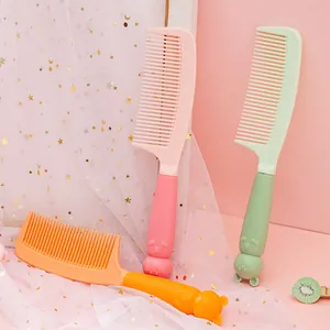 Detailed close-up of cute cartoon animal handle hair combs in various pastel colors