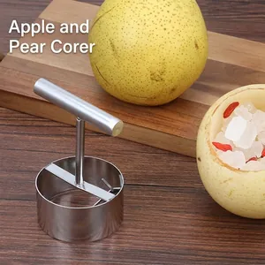 304 stainless steel apple and pear corer tool on a rustic wooden table with fresh pears.