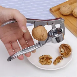 Multi-functional manual stainless steel color garlic press and walnut cracker tool