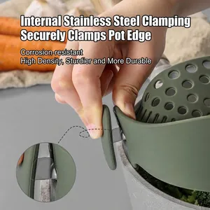 Green silicone clip-on pot strainer with stainless steel inner clip for kitchen use