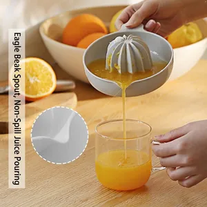 Portable manual citrus juicer with eagle beak spout for drip-free orange juice pouring