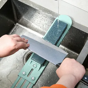 Adjustable whetstone sink bridge holder mounted over a kitchen sink for knife sharpening