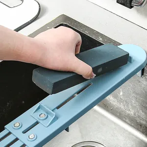 Retractable whetstone sink bridge holder for steady sharpening over the kitchen sink