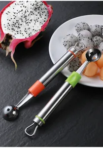 Dual stainless steel fruit ballers with ergonomic orange and green handle details