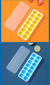 Detail view of 14-grid square silicone ice cube trays with lids in blue and yellow.