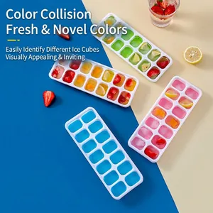 14-grid silicone ice cube tray set with colorful fruit ice on a blue and beige background