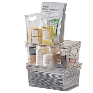 Set of three stackable clear plastic desktop storage boxes for cosmetics organization
