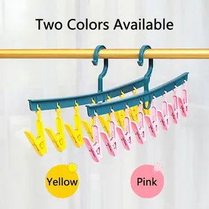 Multi-clip laundry hanger with 10 pegs for socks and underwear, shown in pink and yellow.