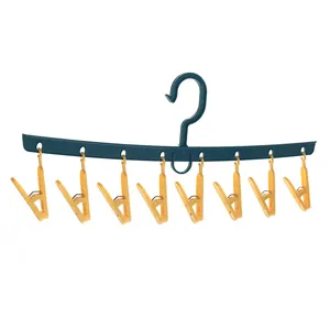 Linear multi-clip plastic clothes drying rack with 9 windproof clips for socks and underwear