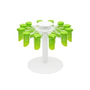 Roterend keukenrek met 10 groene sluitclips voor kruidenzakjes op een witte basis