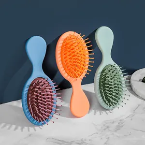 Set di tre mini spazzole per capelli colorate per un massaggio antistatico portatile